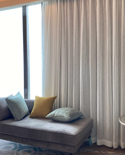 office-room-with-beige-pleated-curtains