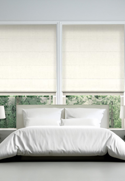 white-roman-blinds-in-bedroom