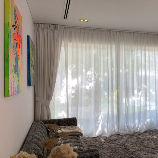 beige-curtains-in-living-room