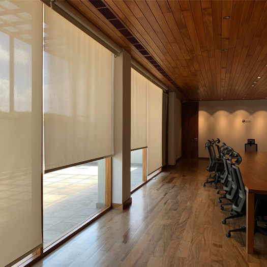 light-brown-roller-blinds-in-conference-room